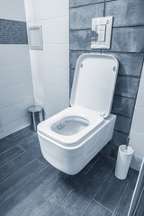 Blue bathroom in a modern room.