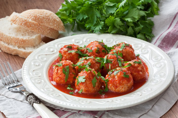 Meatballs with tomato sauce / Delicious homemade chicken or turkey meatballs with rice, vegetable and tomato sauce - obrazy, fototapety, plakaty