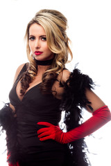 young woman with a feather boa posing.