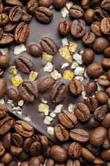 Dark chocolate with coffee grains and fruits. 