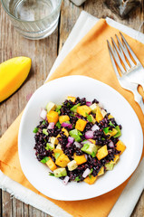 Mango avocado red onion black rice salad