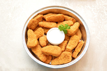 Chicken Nuggets with Ranch Dipping Sauce and Garnished with Parsley