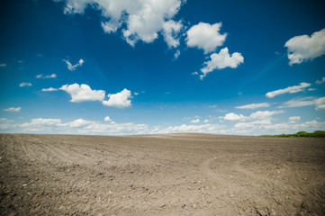 beautiful landscape with the sky and plowed land