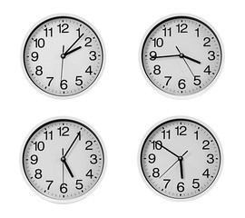 Collage of round wall clocks, isolated on white