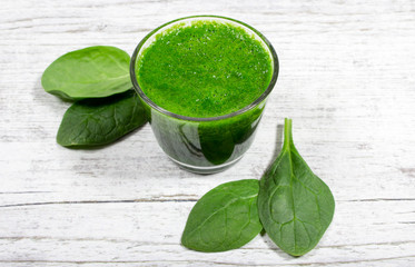 Slimming cocktail with spinach. Glasses of spinach juice.