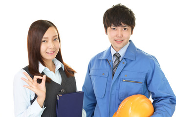 笑顔の労働者とビジネスウーマン