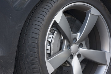 Wheel closeup with brake disc and caliper