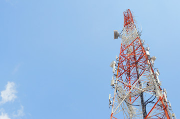 Telecommunication tower with blue sky - 111892903