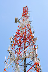 Telecommunication tower with blue sky - 111892907
