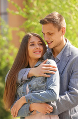 Fototapeta premium Young loving couple in spring park