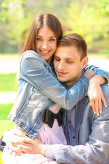 Young loving couple in spring park