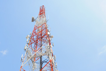 Telecommunication tower with blue sky - 111892932