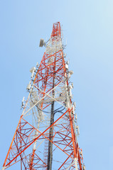 Telecommunication tower with blue sky - 111892943