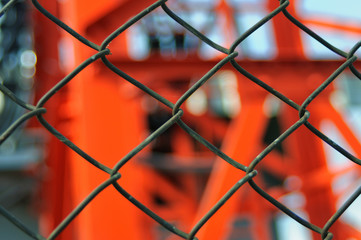 Metal wire fence or cage on abstract blurry background (selectiv - 111893140