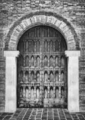 Arched entrance of a medieval palace.