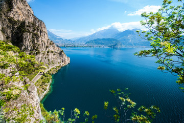 Panorama of the gorgeous Lake Garda surrounded by mountains.