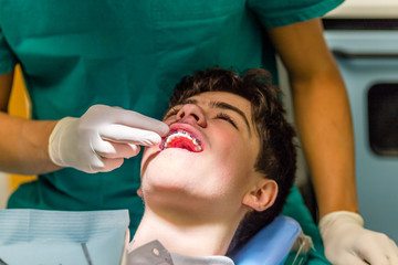 Fototapeta premium boy and orthodontist