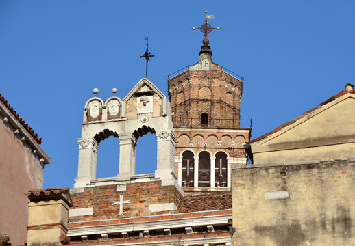 Different types of belfries. Bell towers of Santo Stefano and San Maurizio built in different styles, in the historic center of Venice
