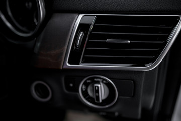 Luxury car dashboard - Air conditioner in luxury car ; Interior detail. - air flow
