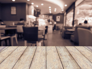 cafe restaurant, coffee shop table with abstract bokeh light bac