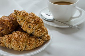 Sesame Croissants and Hot Coffee for Breakfast.