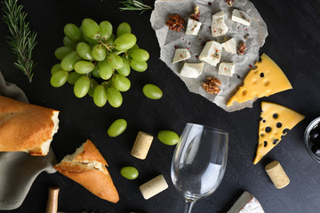 Wine, snacks and different various of cheese, flat lay