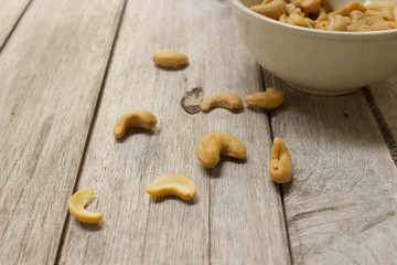 Cashew nuts on a wooden table