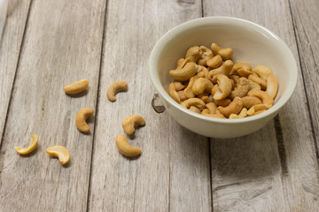 Cashew nuts on a wooden table