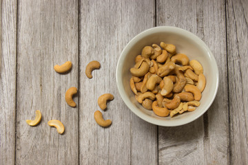 Cashew nuts on a wooden table