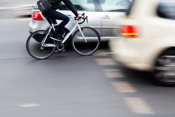 cyclist in city traffic