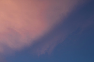 Colorful clouds with dark blue sky in evening