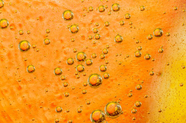 Oil drops on a water surface