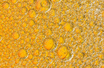 Oil drops on a water surface