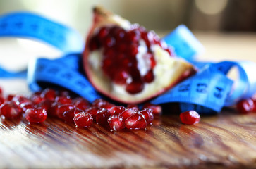 diet mesaure fruit pomegranate on wood