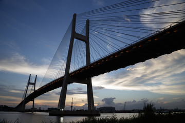 Phu My bridge in Ho Chi Minh city, Vietnam under sunset