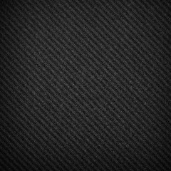 black compressed board with striped background