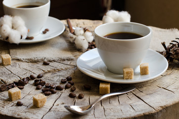 two cups coffee old wooden stump