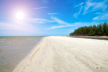 Fototapeta na wymiar Blue sky and sand on the beach.