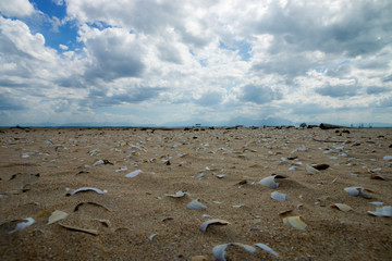 Beautiful sky and sand with white clouds.