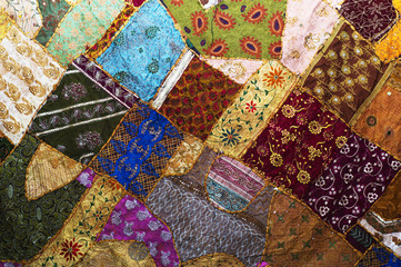 Bedspread patchwork in oriental style, closeup. Patchwork quilt