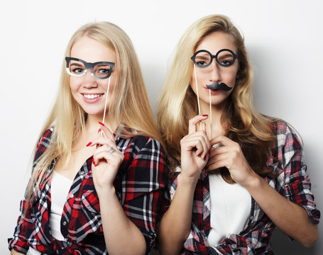 two stylish sexy hipster girls best friends ready for party