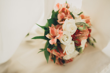 Wonderful luxury wedding bouquet of different flowers