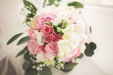 Wonderful luxury wedding bouquet of different flowers