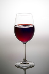 Red Wine in glass on white background