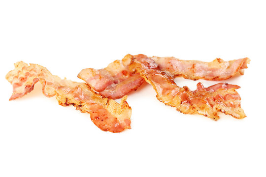 Crispy strips of bacon isolated on a white