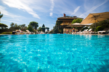 Fototapeta na wymiar Beautiful swimming pool in tropical resort , close up
