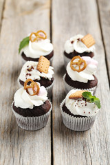 Chocolate cupcakes on a grey wooden table