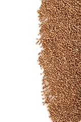 Buckwheat seeds on a white background