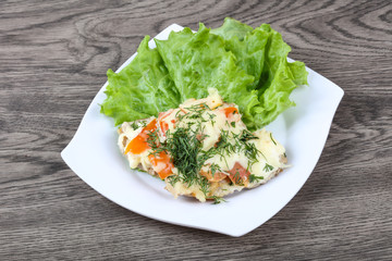 Meat covered cheese and tomato