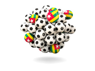 Pile of footballs with flag of togo
